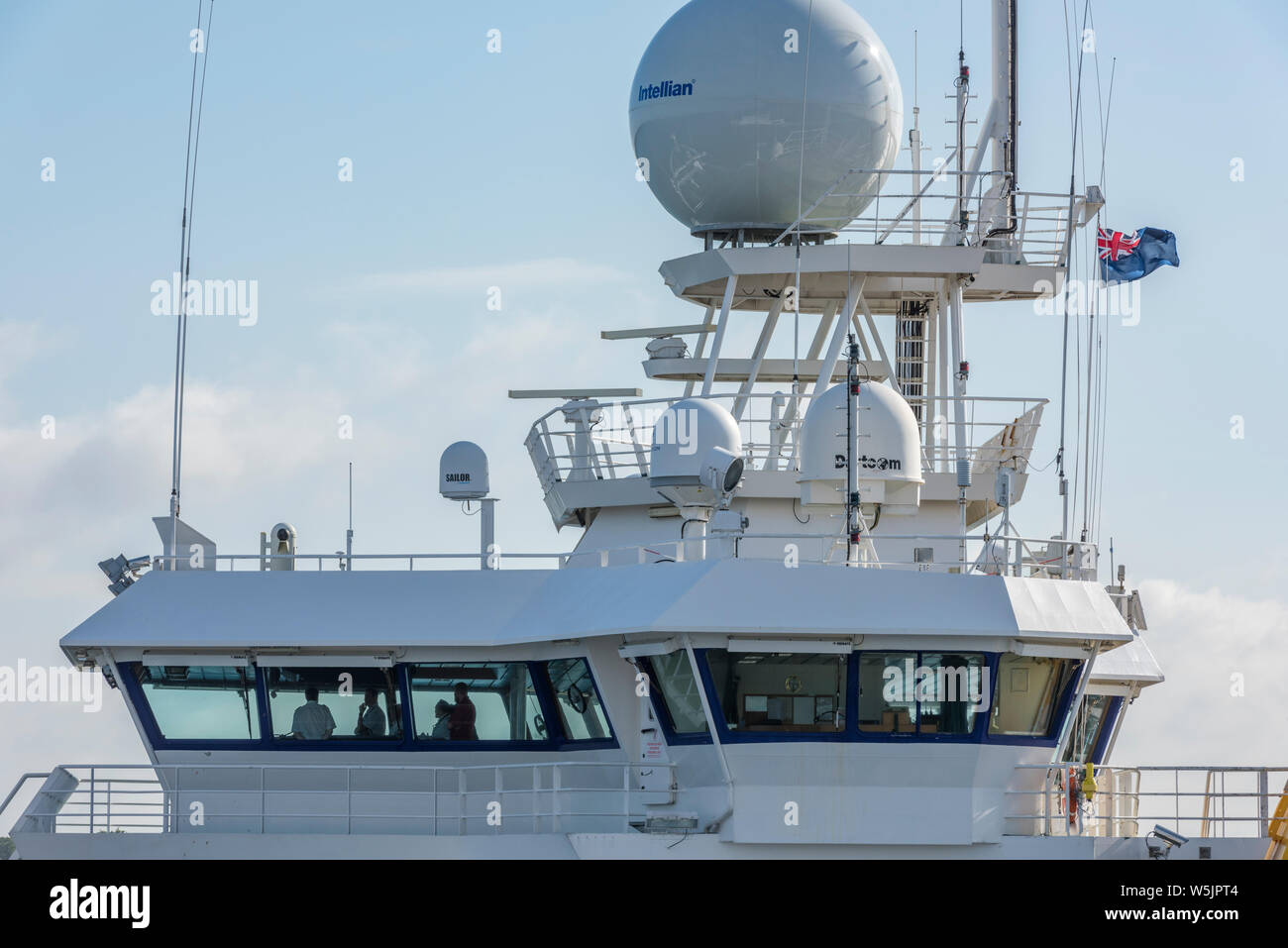 the RRC James Cook survey oceanography seabed exploration vessel bridge entering Southampton water. Stock Photo