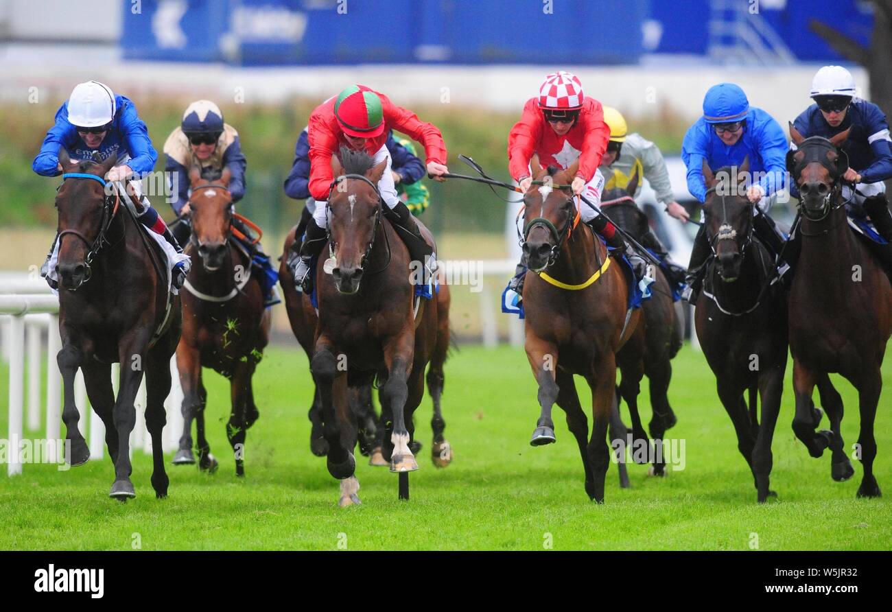 Halimi & Kevin Manning (blue colours, white cap) turn into the home straight to win the Eventus Handicap during day one of the 2019 Summer Festival at Galway Racecourse. Stock Photo