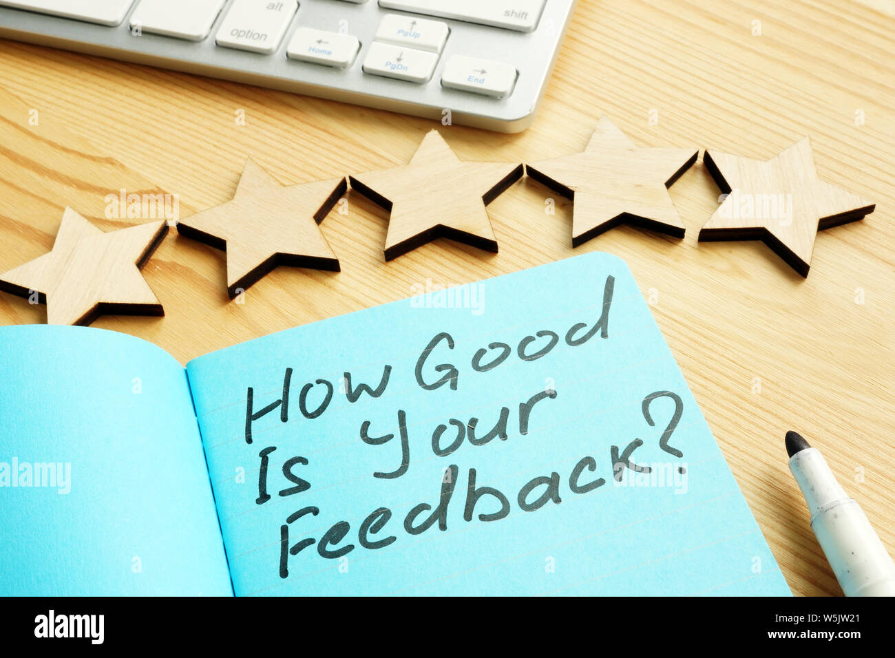 How Good Is Your Feedback sign and five stars for assessment. Stock Photo