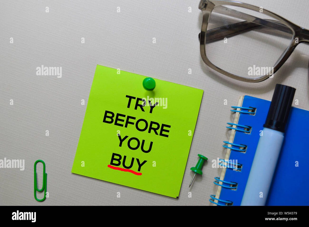 Try Before You Buy text on sticky notes isolated on office desk Stock ...