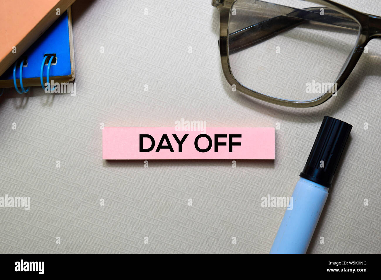 Day Off text on sticky notes isolated on office desk Stock Photo