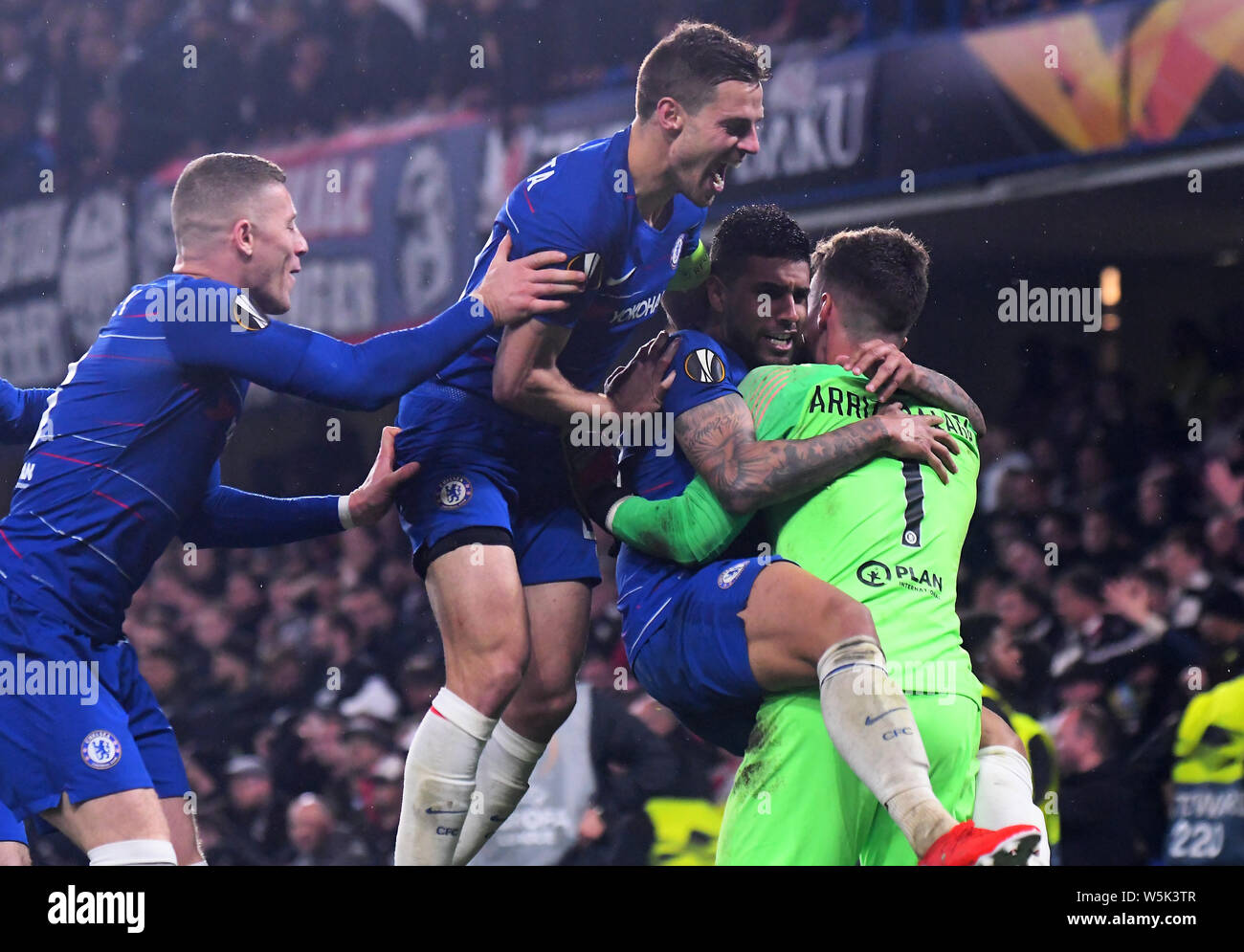 LONDON, ENGLAND - MAY 9, 2019: (From L to R) Ross Barkley of Chelsea, Cesar Azpilicueta of Chelsea, Emerson Palmieri dos Santos of Chelsea and Kepa Arrizabalaga of Chelsea celebrate after the second leg of the 2018/19 UEFA Europa League Semi-Finals game between Chelsea FC (England) and Eintracht Frankfurt e.V. (Germany) at Stamford Bridge. Stock Photo