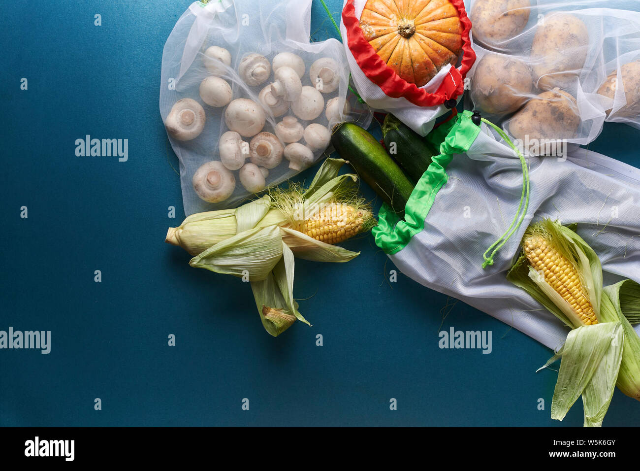 vegetables in reusable bags. zero waste concept. top view Stock Photo ...
