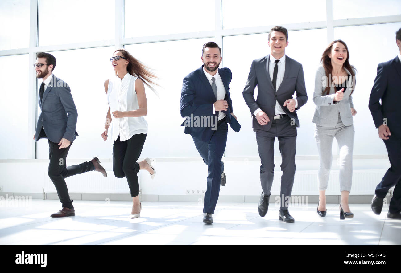 Project Team Running business team running together Stock Photo - Alamy