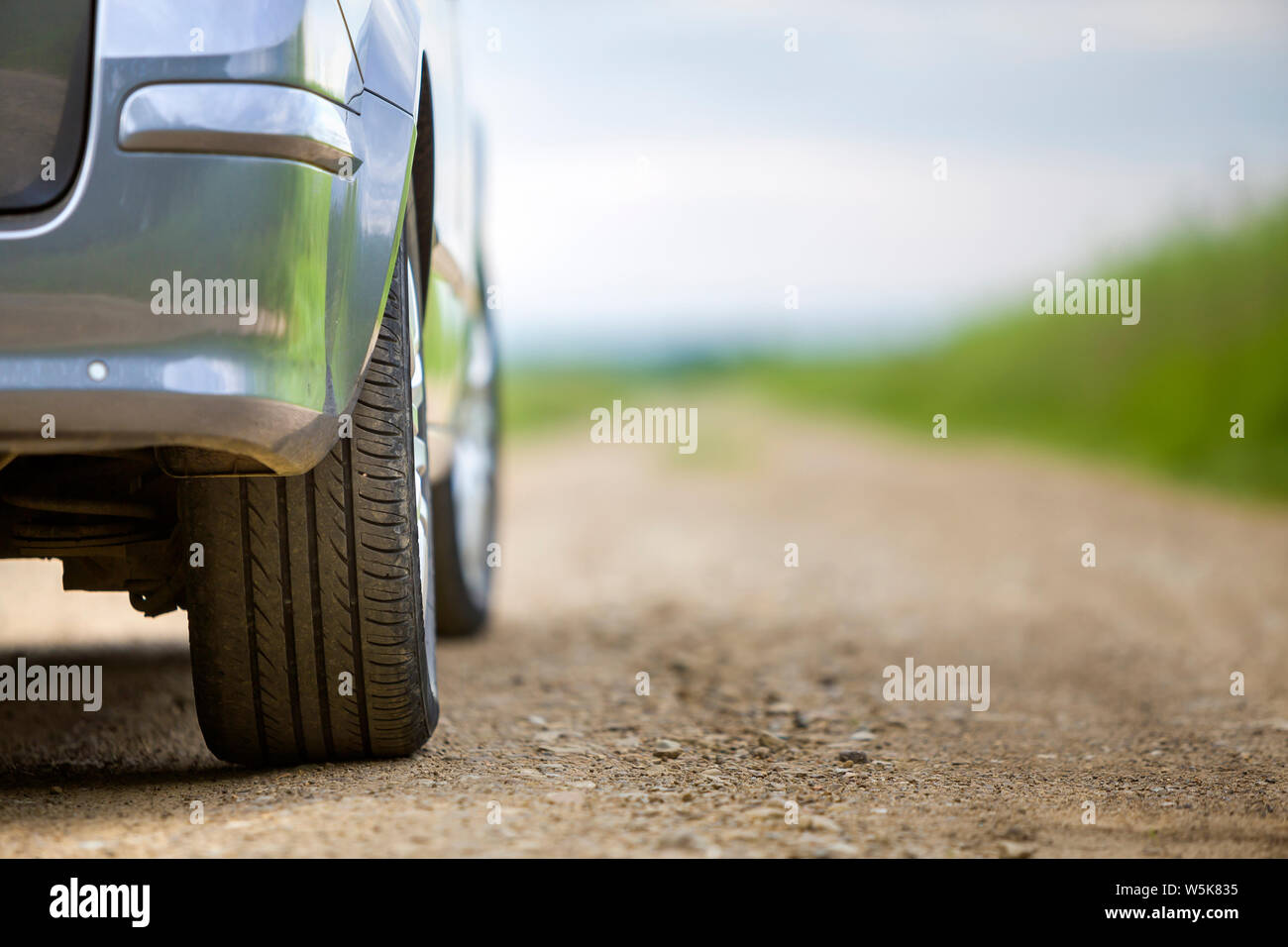Close-up detail of car part, wheels with aluminum disc and black rubber ...