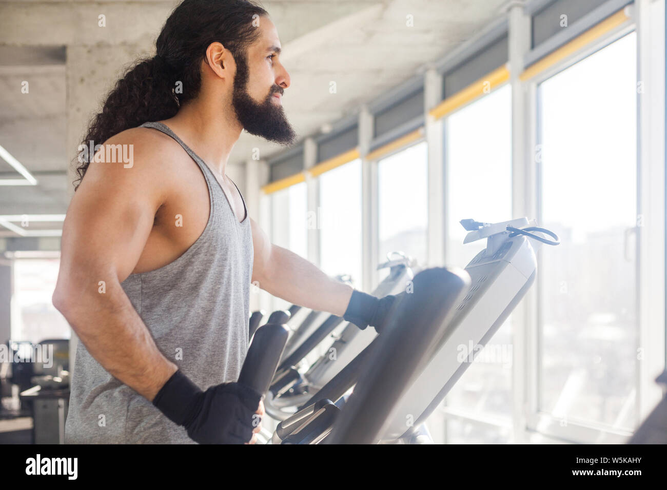 Man walking side view arms hi-res stock photography and images - Alamy