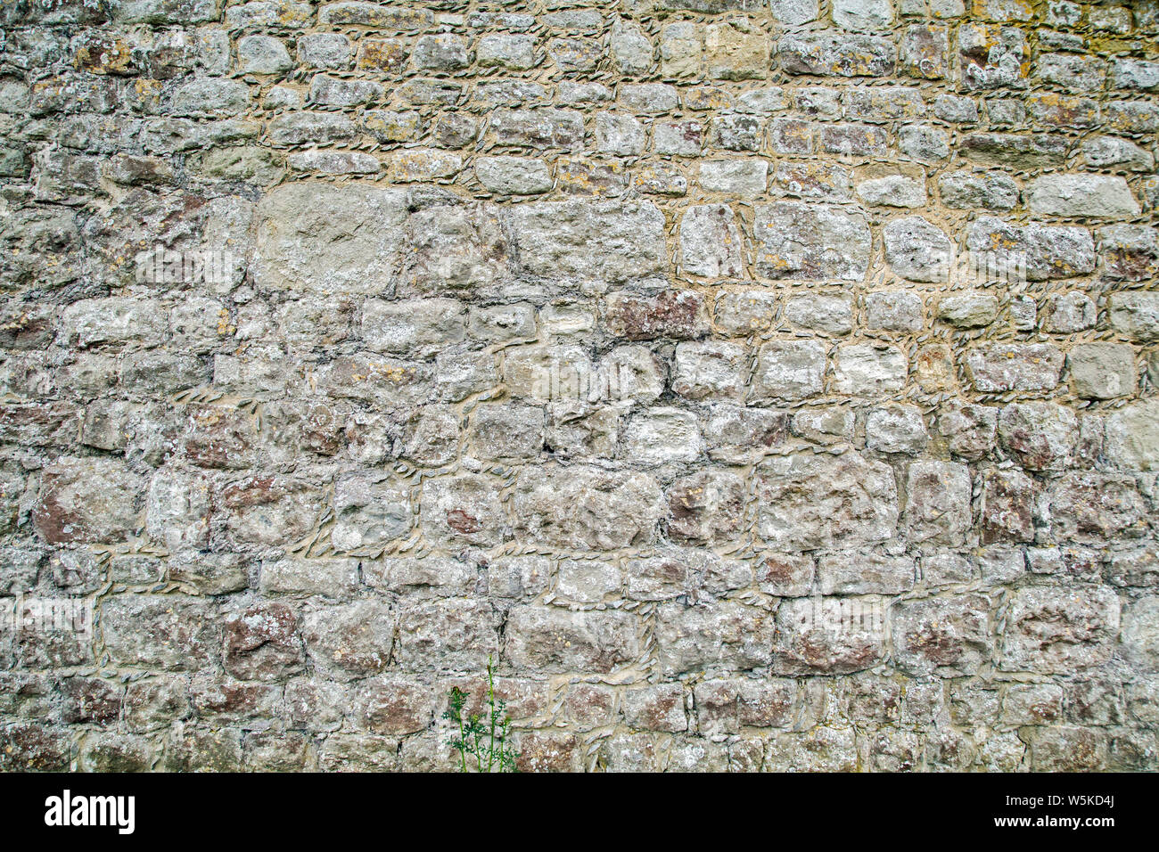 Ancient stone wall texture background Stock Photo