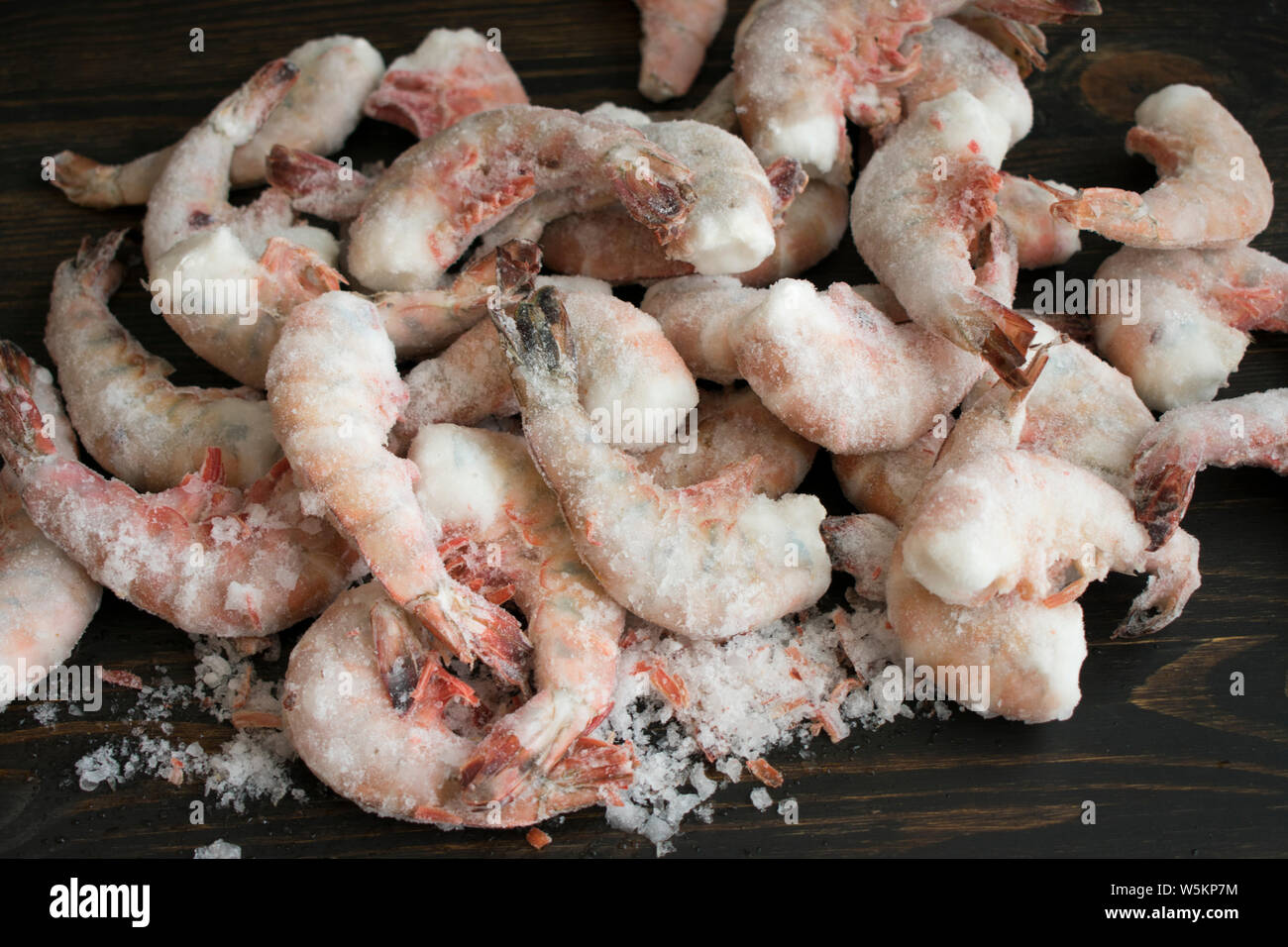 Frozen Jumbo Shrimp on a Wood Background Stock Photo Alamy