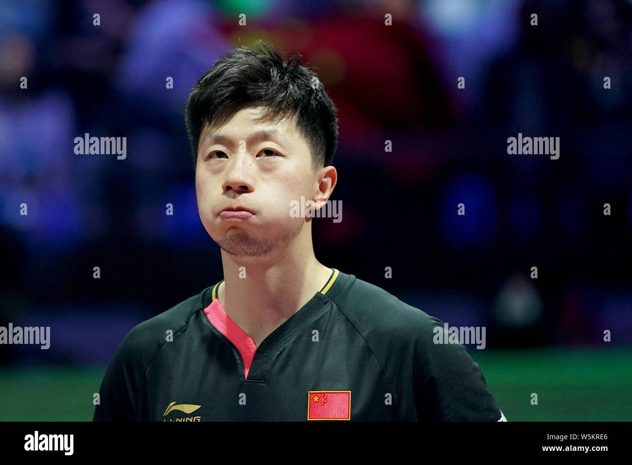Ma Long of China reacts as he competes against Mattias Falck of Sweden in their final match of Men's Singles during the Liebherr 2019 ITTF World Table Stock Photo