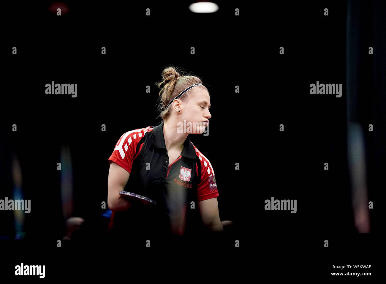 Natalia Partyka of Poland reacts as she competes against Mateja Jeger ...