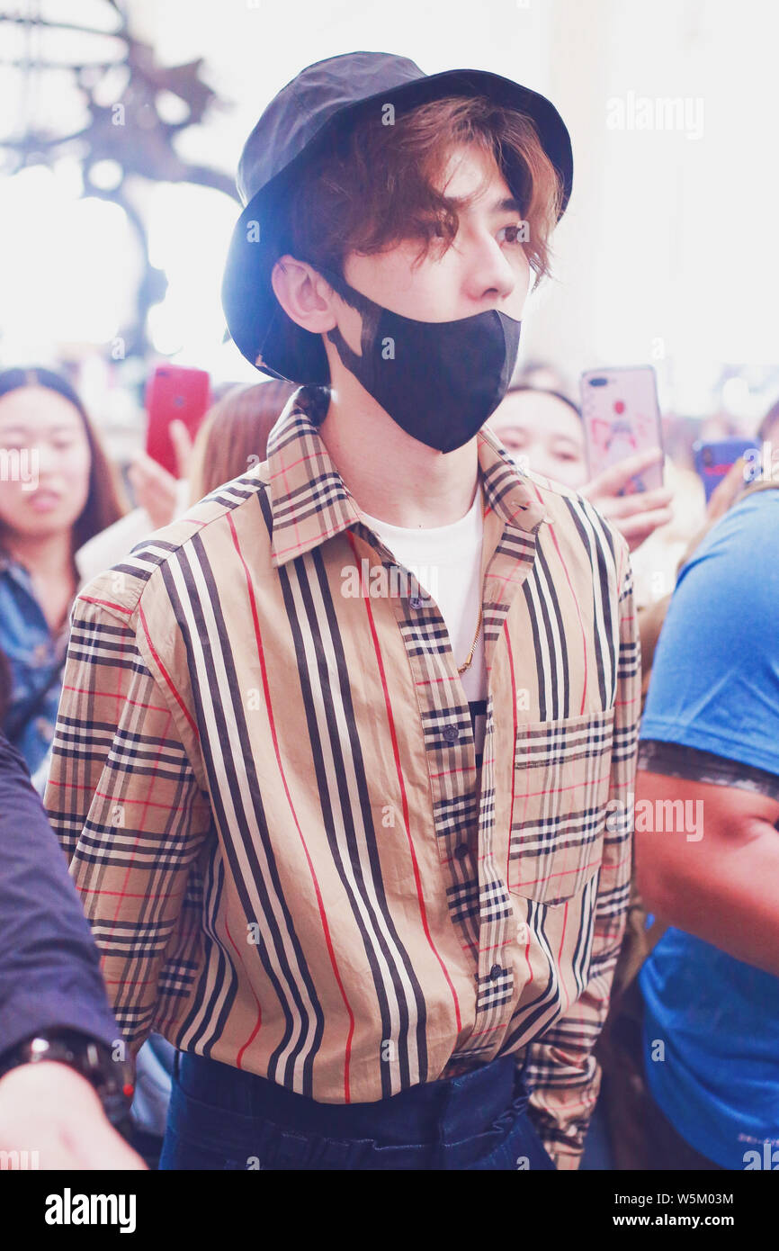 Singer and rapper Cai Xukun of Chinese boy group Nine Percent arrives at the Beijing Capital International Airport in Beijing, China, 25 April 2019. Stock Photo