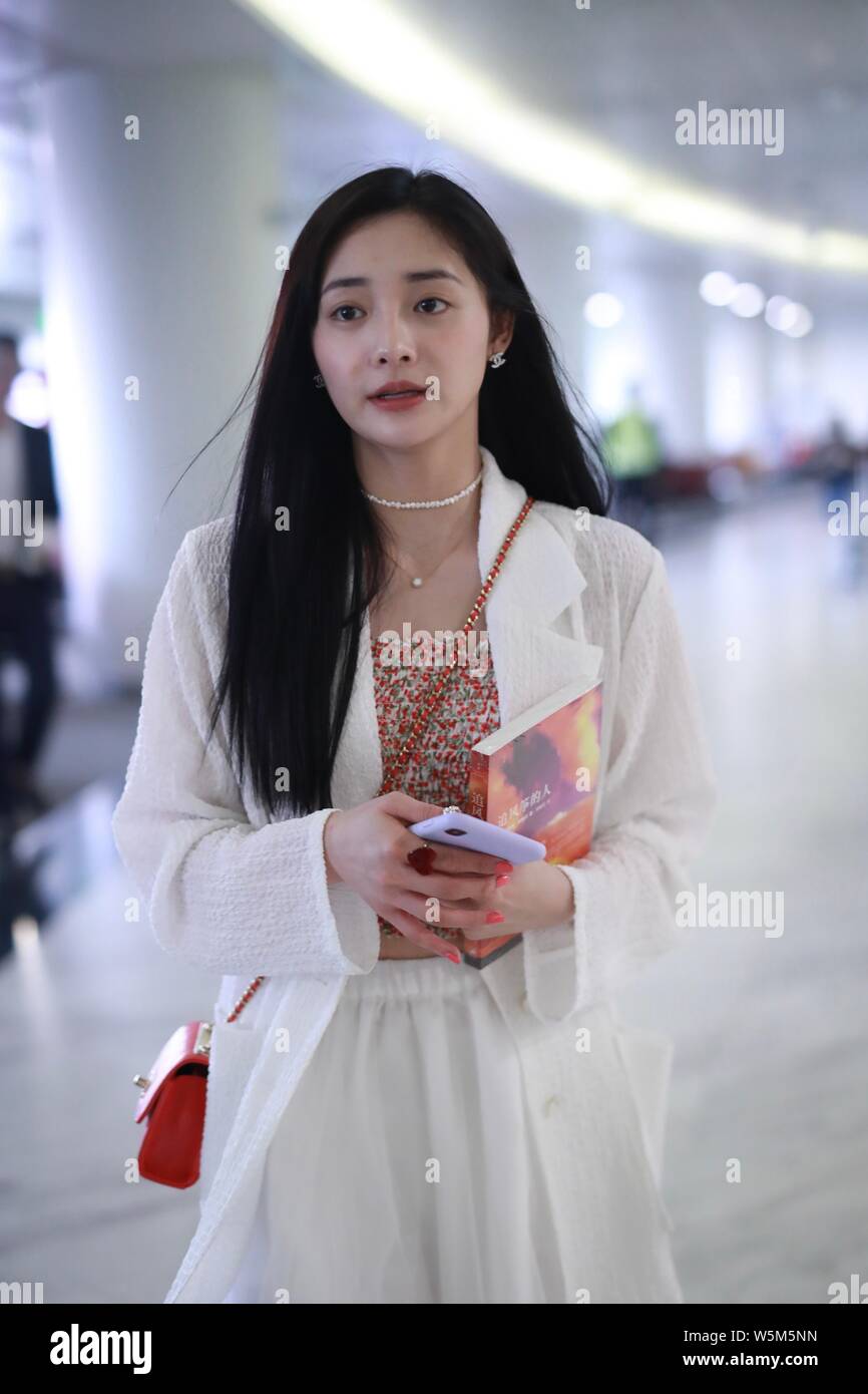 Chinese singer and dancer Pinky Zhou or Zhou Jieqiong arrives at the