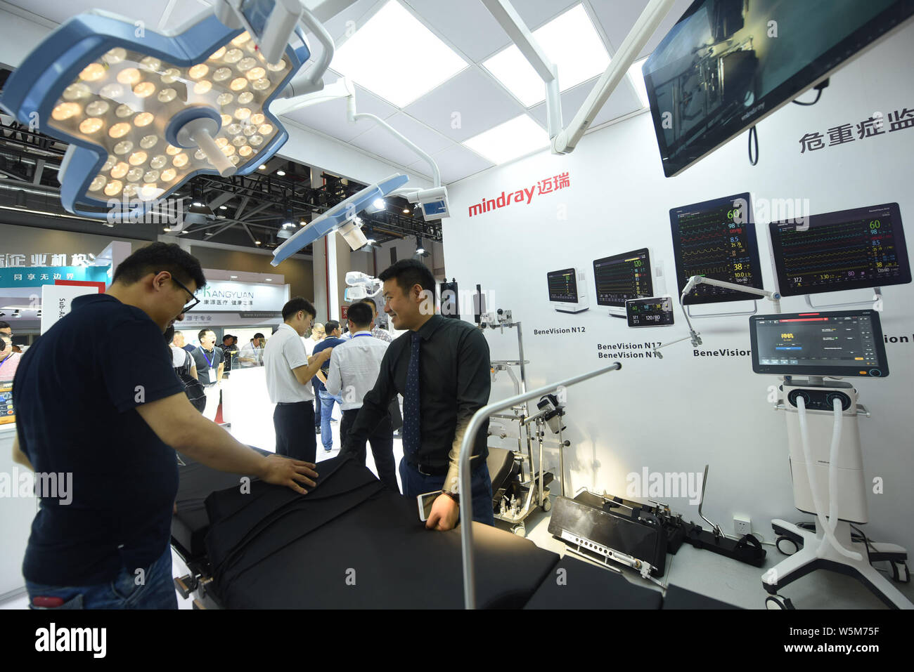 --FILE--People visit the stand of China's leading producer of medical devices Shenzhen Mindray Bio-Medical Electronics Co. Ltd. during an expo in Hang Stock Photo