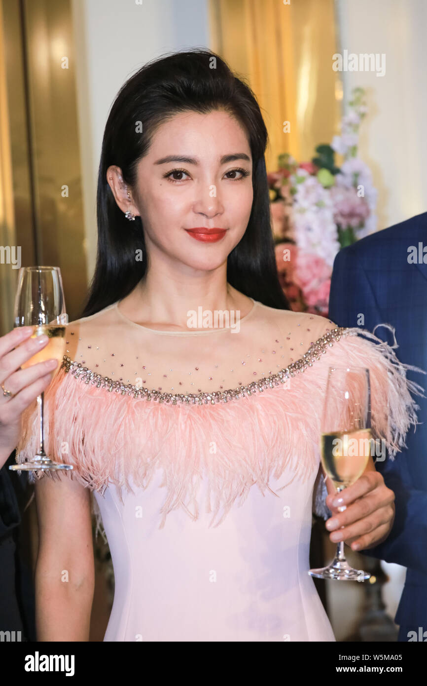 Chinese actress Li Bingbing attends the ribbon-cutting ceremony for Jenny Packham in Shanghai, China, 3 April 2019. Stock Photo