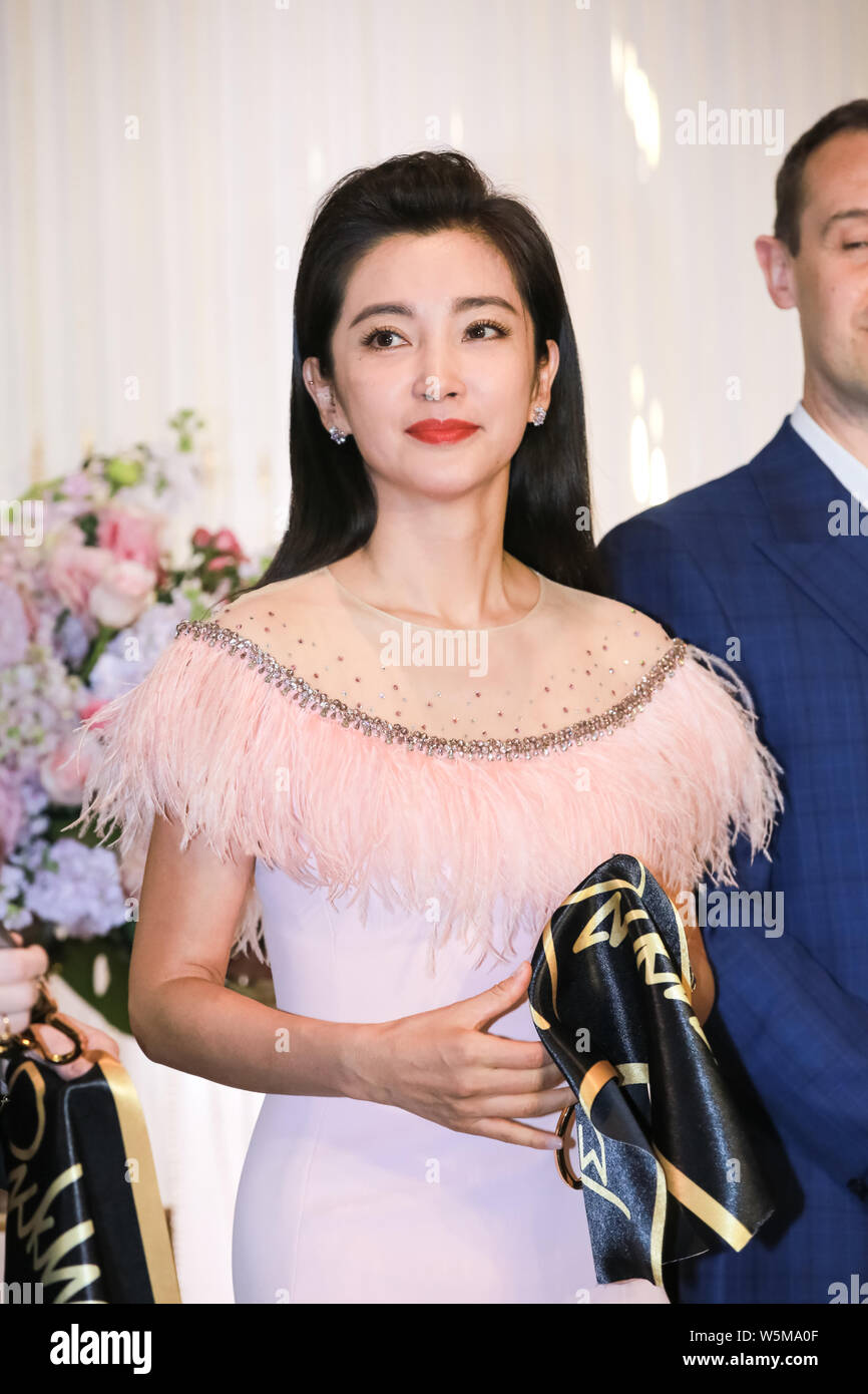 Chinese actress Li Bingbing attends the ribbon-cutting ceremony for Jenny Packham in Shanghai, China, 3 April 2019. Stock Photo