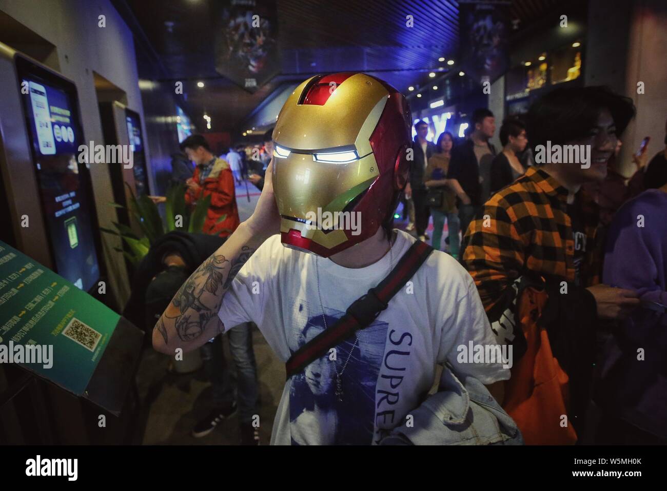 A Chinese Filmgoer Wearing The Iron Man Helmet Is Pictured At A Cinema Before The Midnight Premiere Of Marvel Studios Avengers Endgame In Beijing C Stock Photo Alamy