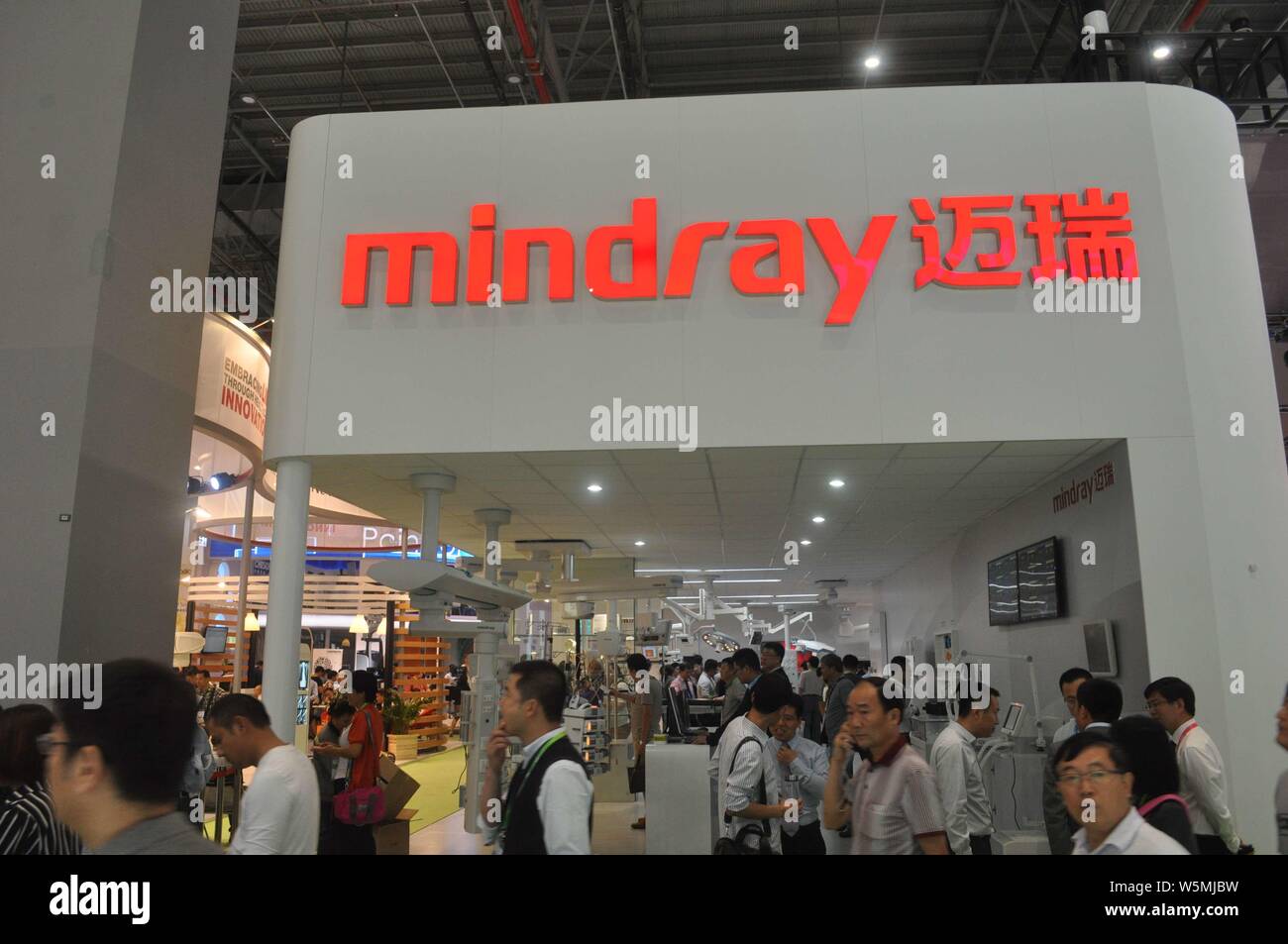 --FILE--People visit the stand of China's leading producer of medical devices Shenzhen Mindray Bio-Medical Electronics Co. Ltd. during an expo in Shan Stock Photo