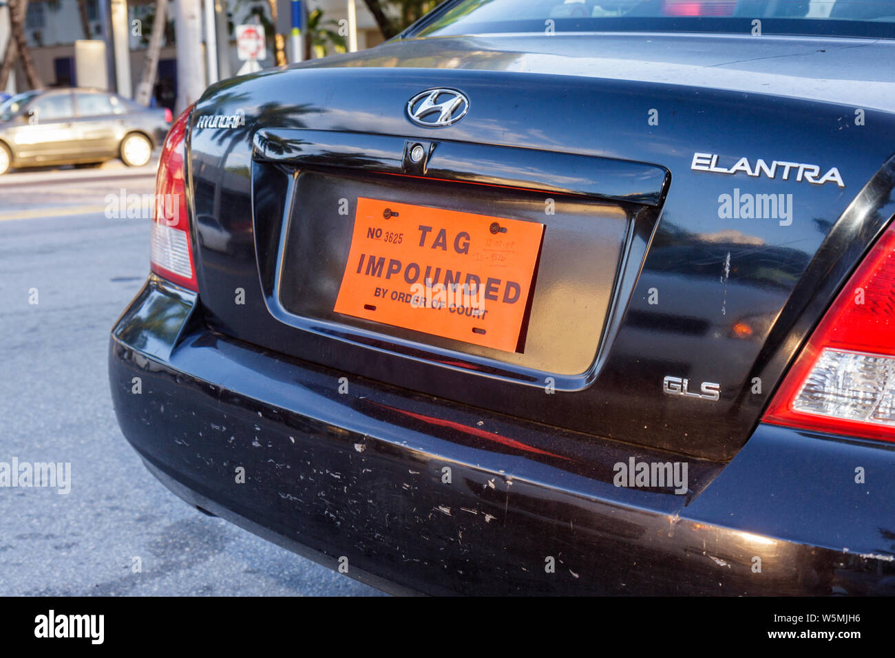Miami Beach Florida,parked car,auto,Hyundai,Elantra,tag,impounded,by