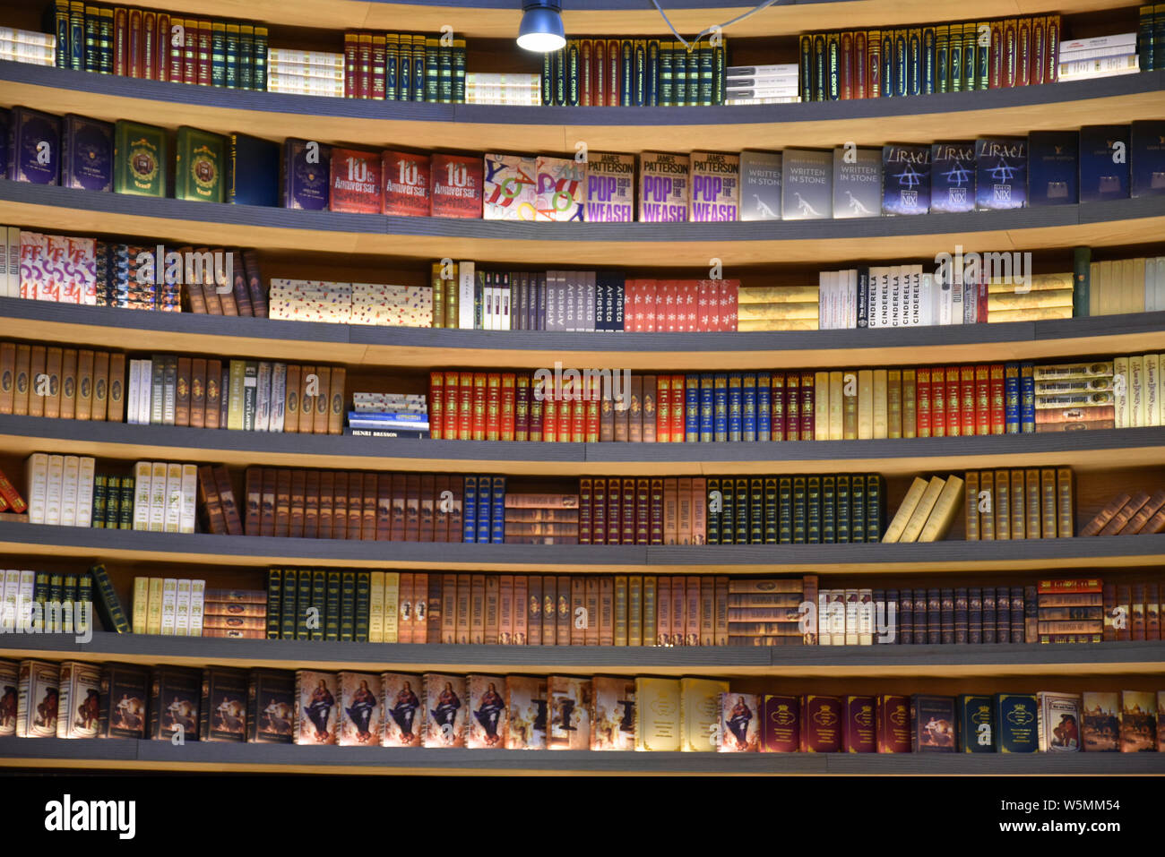 Customers read books at a new bookstore stacked with the innovative ...