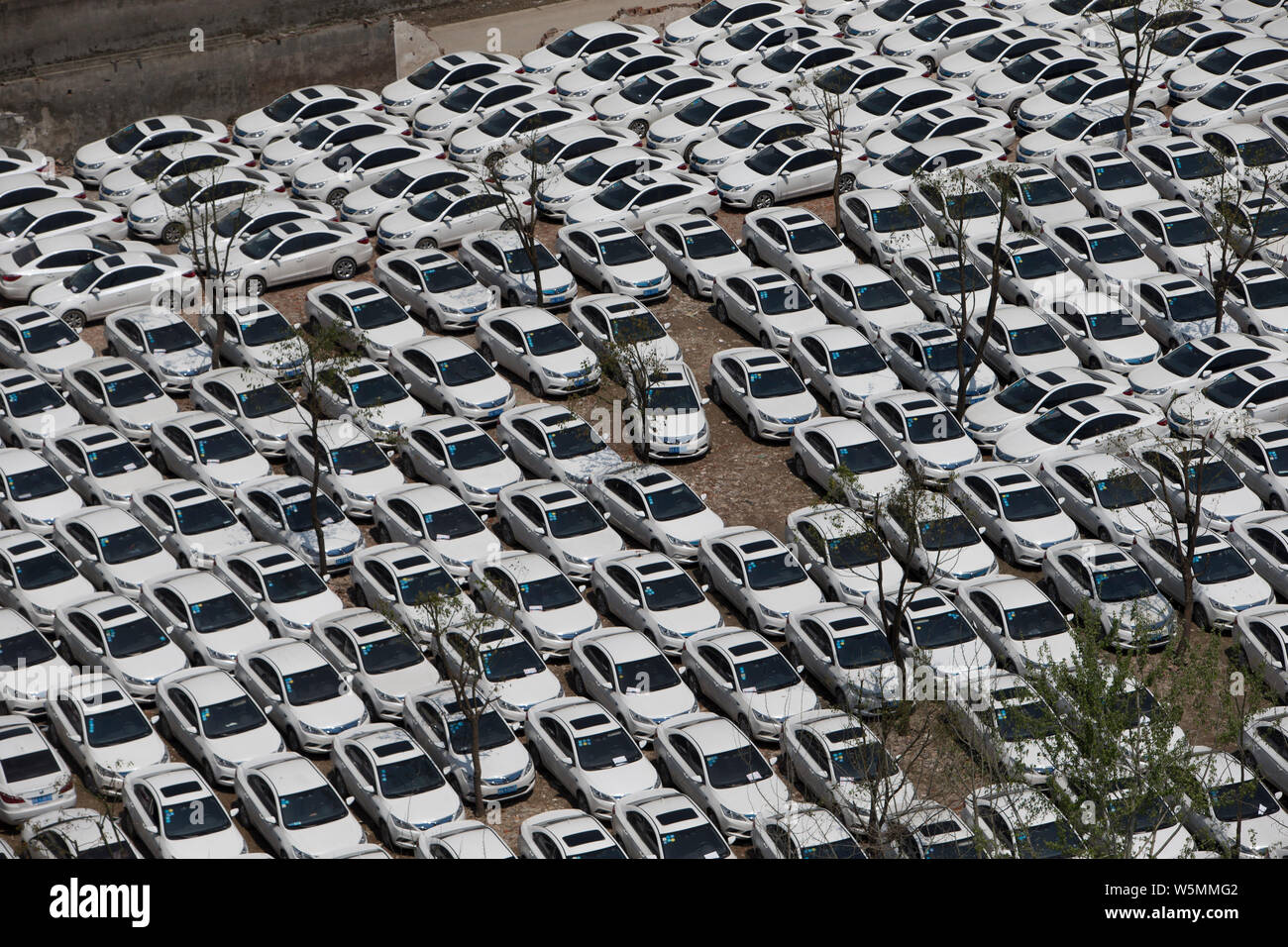 Broken and abandoned electric vehicle (EV) of a Chinese carsharing