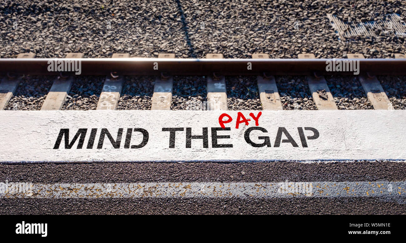 Pay gap, mind the pay gap graffiti inequality gap between employees pay concept illustration Stock Photo