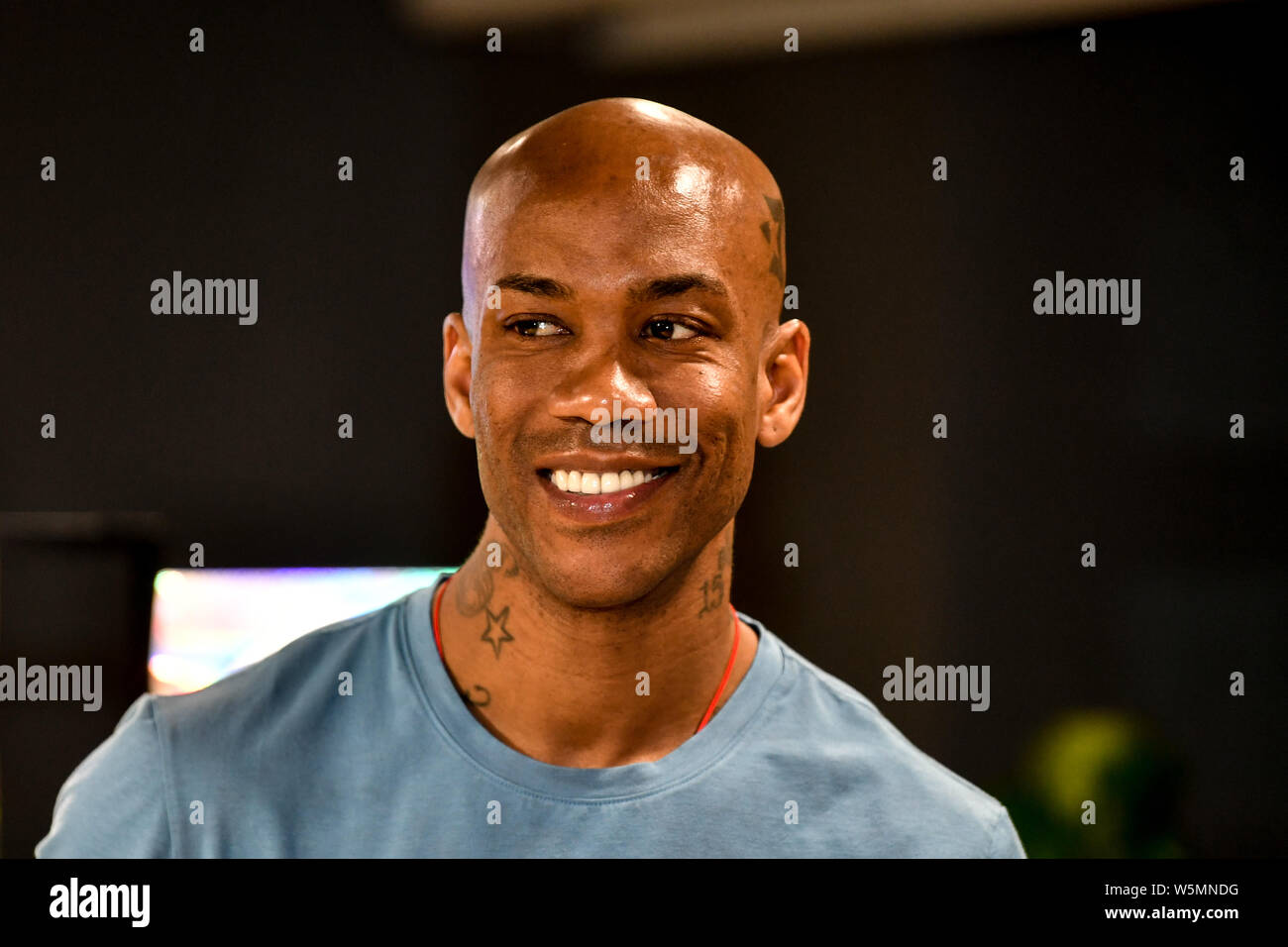 Retired American basketball player Stephon Marbury attends a fan