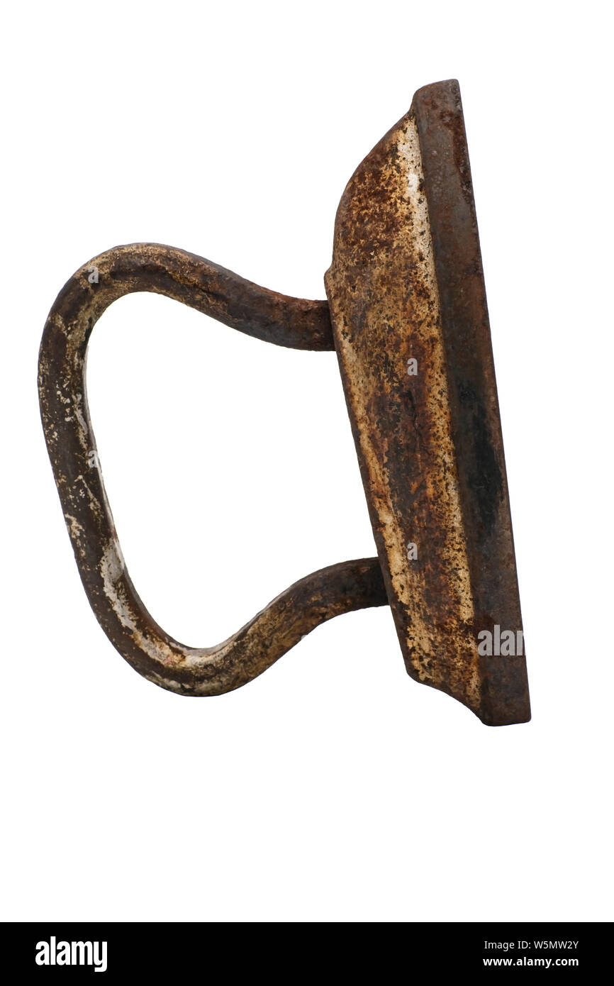 Old vintage cast iron iron. Isolate on white background Stock Photo - Alamy