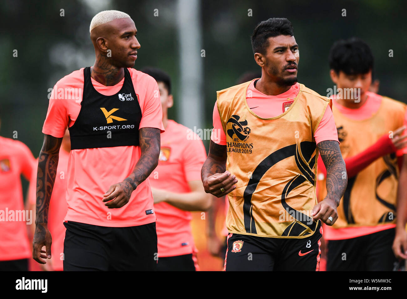 Brazilian football players Paulinho and Anderson Souza Conceicao, known as  Anderson Talisca or simply Talisca, of China's Guangzhou Evergrande Taobao  Stock Photo - Alamy