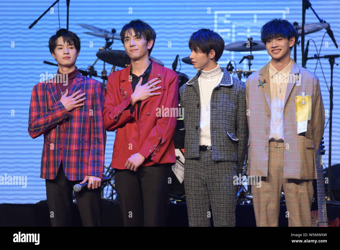 The members of Chinese boy band VOGUE5 attend their debut showcase in