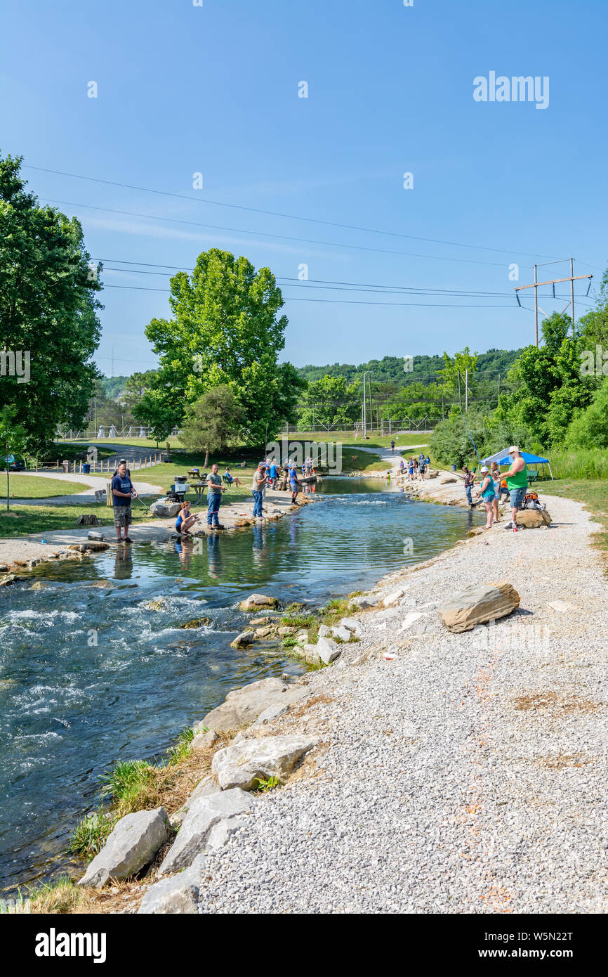 Fishing for trout at the Wolf Creek National Fish Hatchery in Kentucky on  the weekend of the annual kids fishing derby Stock Photo - Alamy