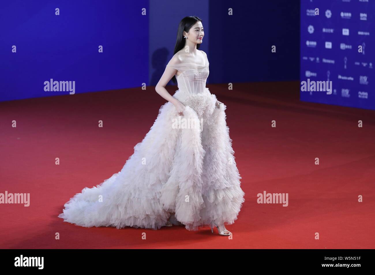 Chinese actress Guan Xiaotong arrives on the red carpet for the closing