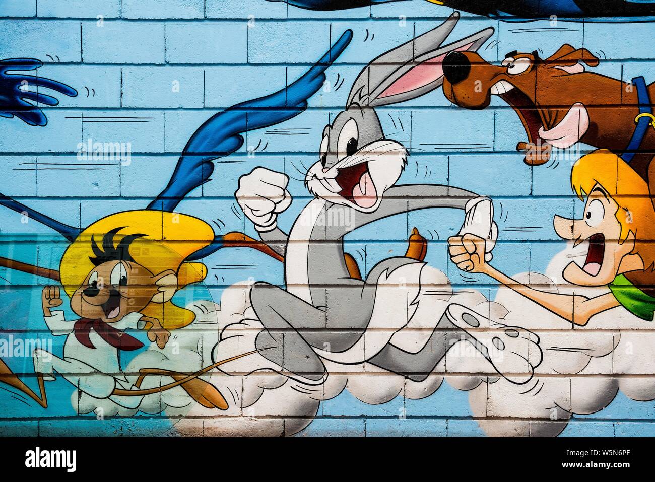 Painted house wall with cartoon characters, Speedy Conzales, Bugs Bunny, Graffiti, Porte de Clignancourt, Paris, FrancePainted house wall, Graffiti Stock Photo