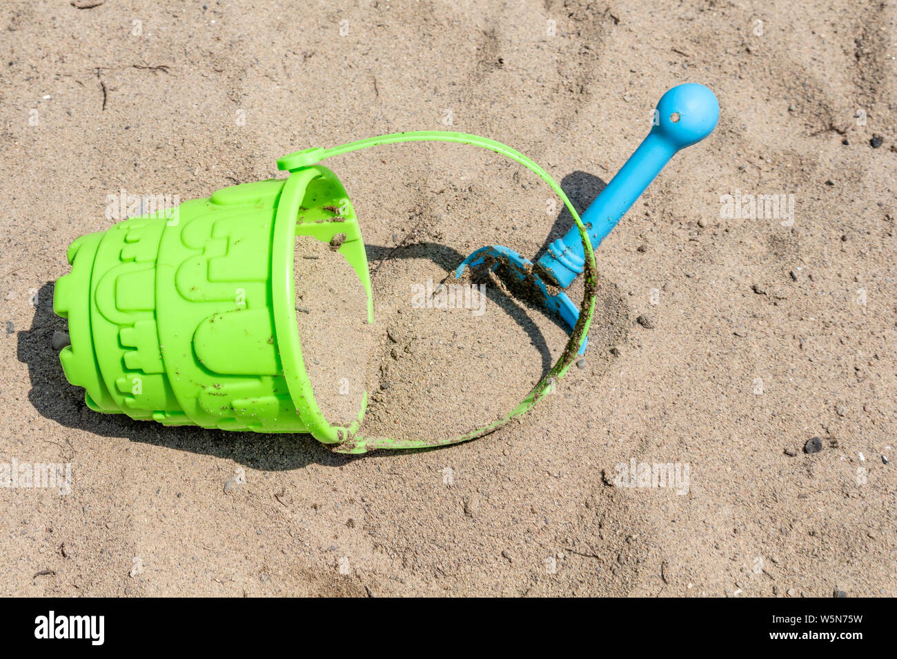 sand bucket with water hose