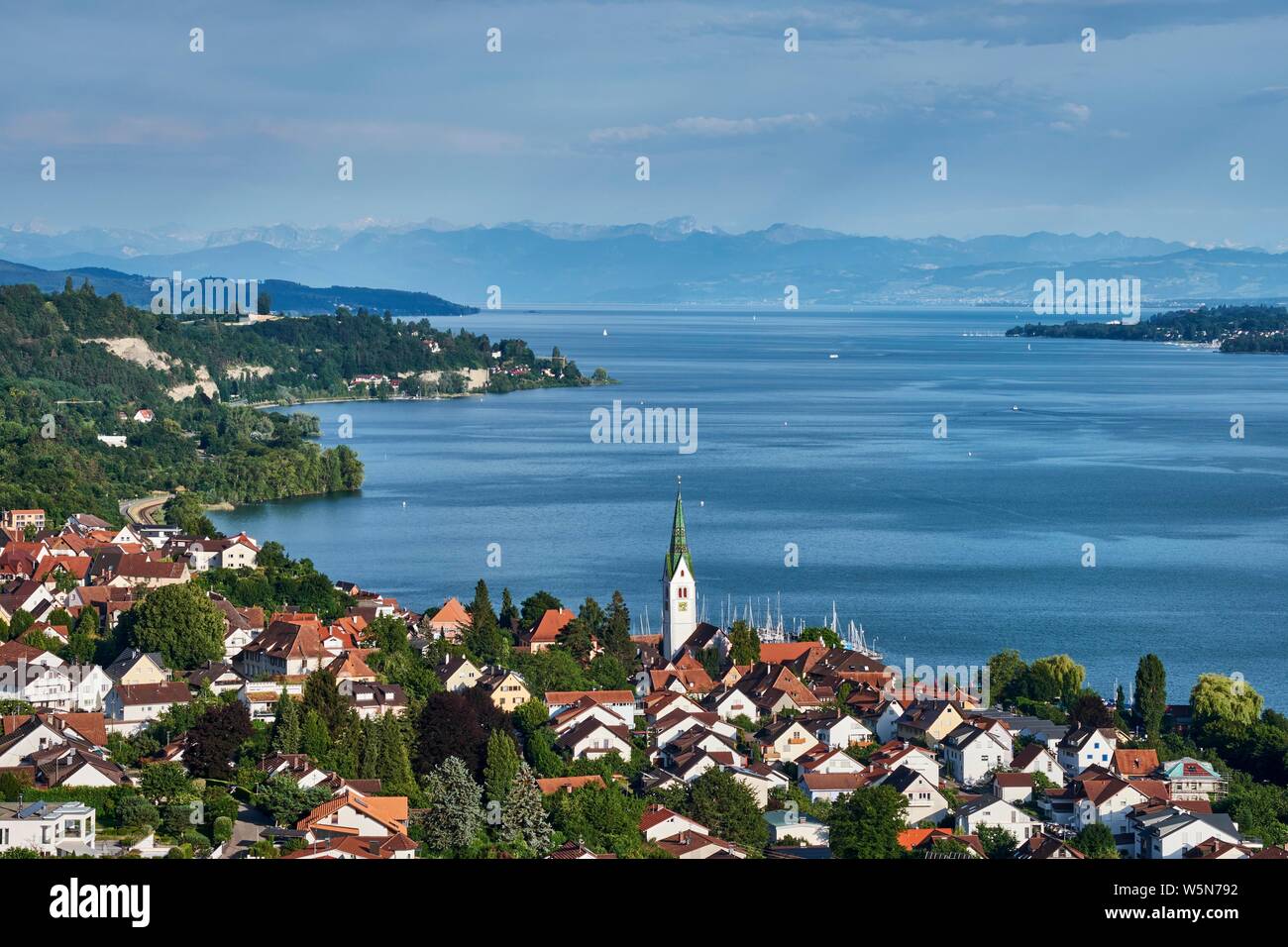 View over Lake Constance, with the village of Sipplingen, on the horizon the Swiss Alps, Lake Constance, Baden-Wurttemberg, Germany Stock Photo