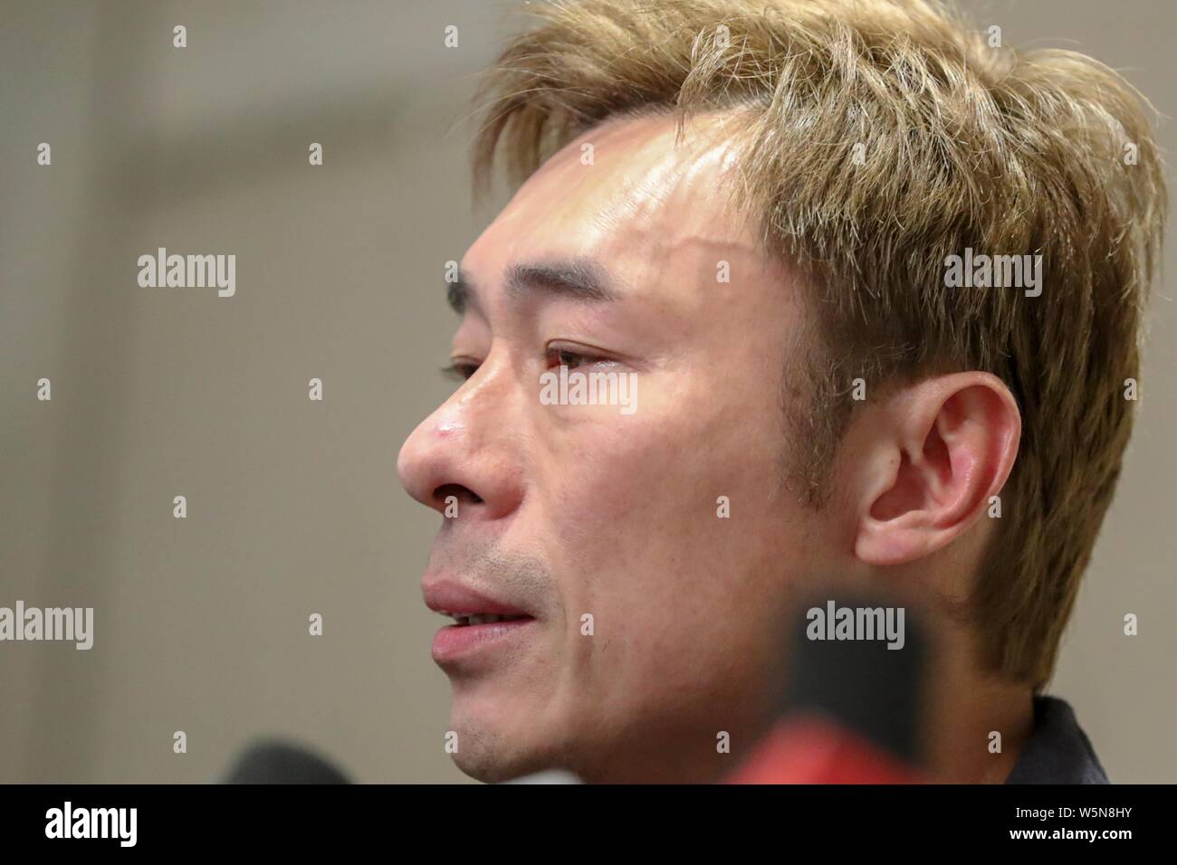 Hong Kong singer Andy Hui or Hui Chi-on speaks and weeps during a press conference to apologize to the public for cheating on his superstar wife Sammi Stock Photo