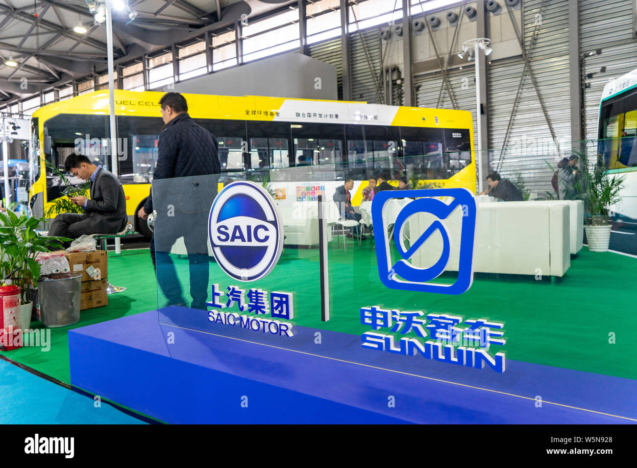 --FILE--View of the stand of SAIC Motor and Sunwin Bus during an automobile exhibition in Shanghai, China, 20 November 2018.   SAIC Motor Corp Ltd, a Stock Photo