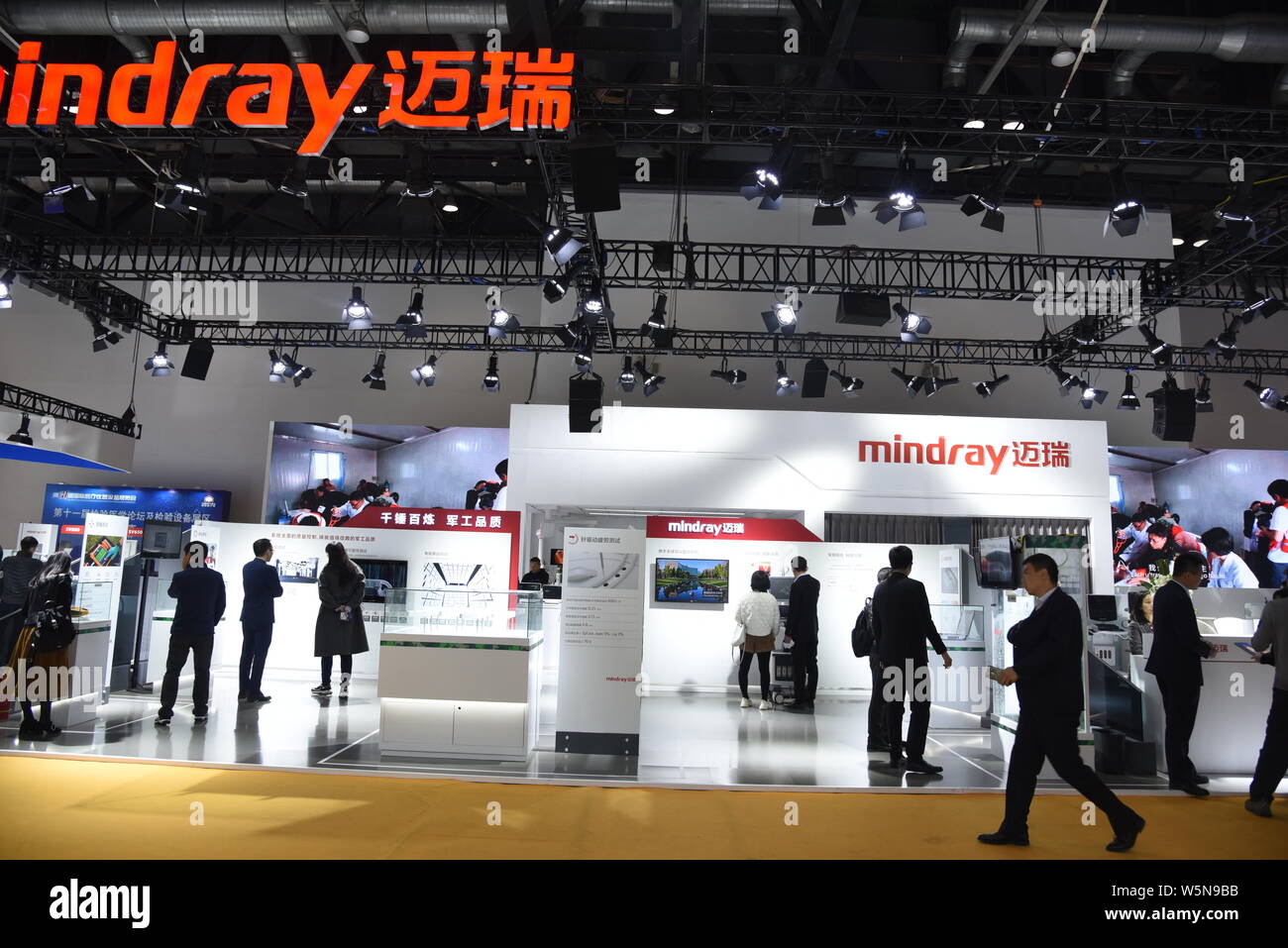 --FILE--People visit the stand of China's leading producer of medical devices Shenzhen Mindray Bio-Medical Electronics Co. Ltd. during an expo in Beij Stock Photo