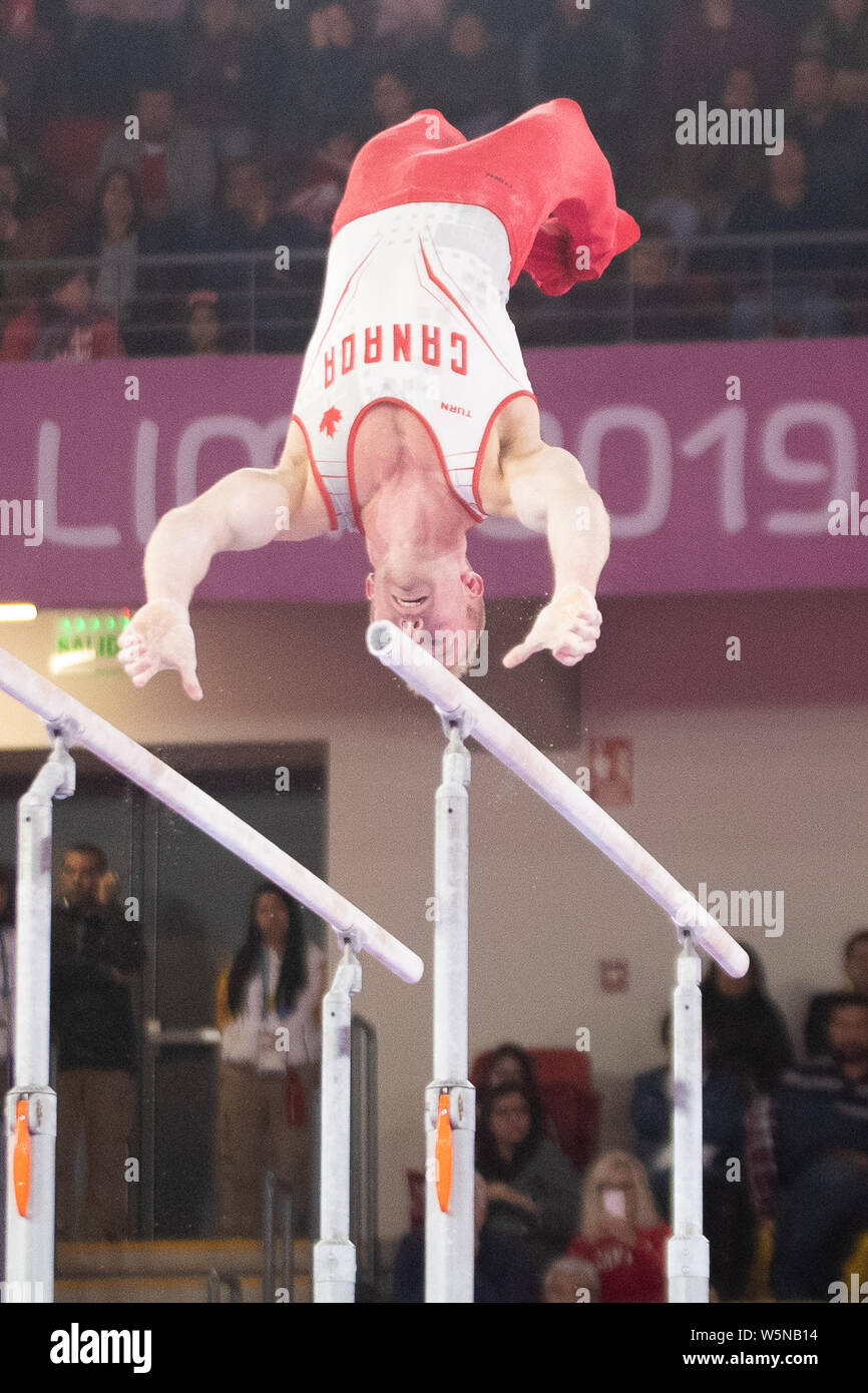 Lima, Peru. 28th July, 2019. Cory Paterson (#85) of Canada performs on the parallel bars during the Pan American Games Artistic Gymnastics, Men's Team Qualification and Final at Polideportivo Villa el Salvador in Lima, Peru. Daniel Lea/CSM/Alamy Live News Stock Photo