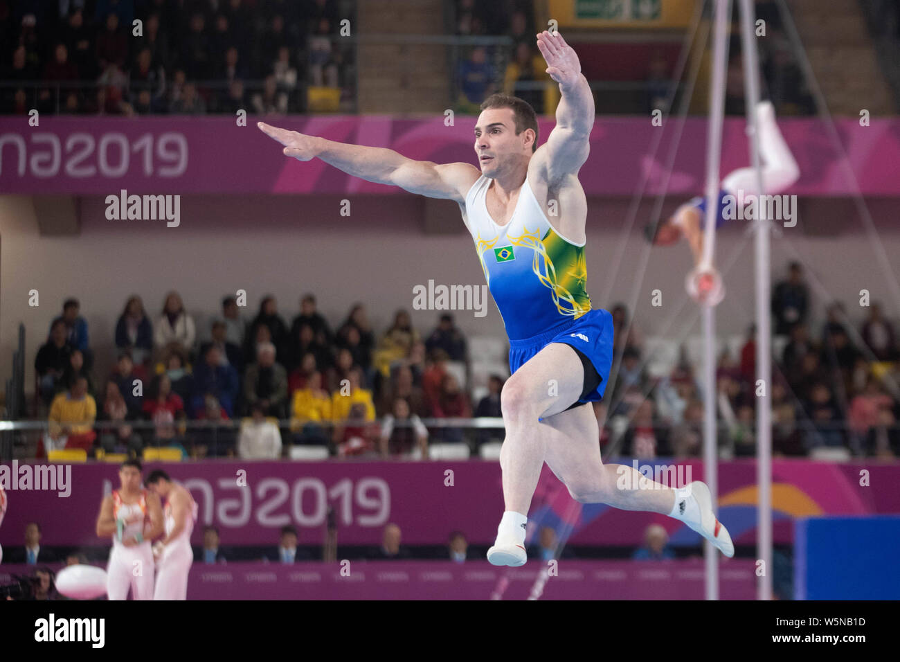 Lima, Peru. 28th July, 2019. Arthur Zanetti (#81) of Brazil warms up priorate his floor routine the Pan American Games Artistic Gymnastics, Men's Team Qualification and Final at Polideportivo Villa el Salvador in Lima, Peru. Daniel Lea/CSM/Alamy Live News Stock Photo