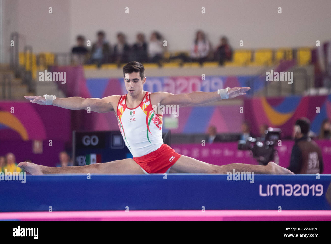 Lima, Peru. 28th July, 2019. Daniel Corral (#107) of Mexico performs his floor routine during the Pan American Games Artistic Gymnastics, Men's Team Qualification and Final at Polideportivo Villa el Salvador in Lima, Peru. Daniel Lea/CSM/Alamy Live News Stock Photo