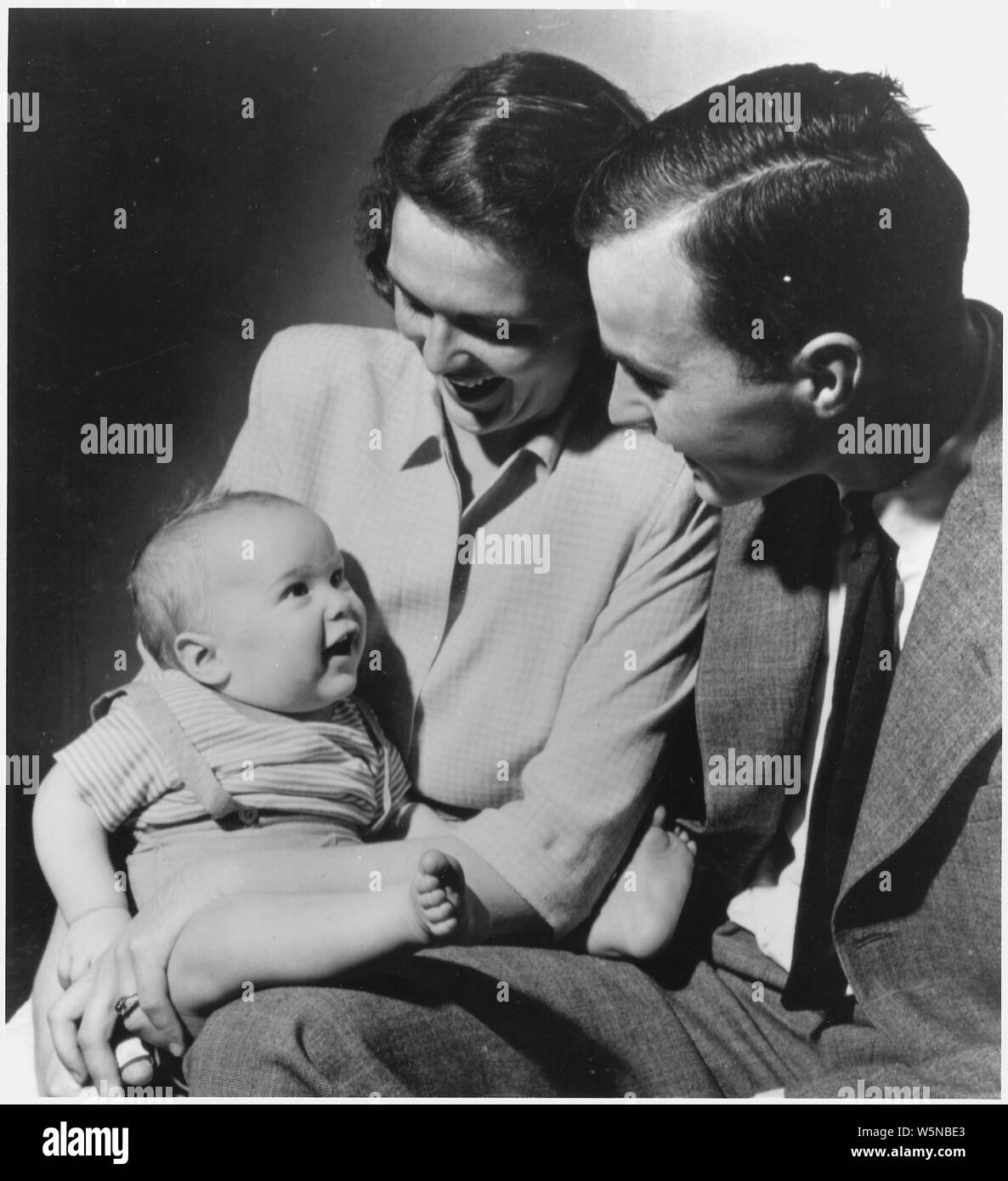 George and Barbara Bush with their first born child George W. Bush, while Bush was a student at Yale Stock Photo