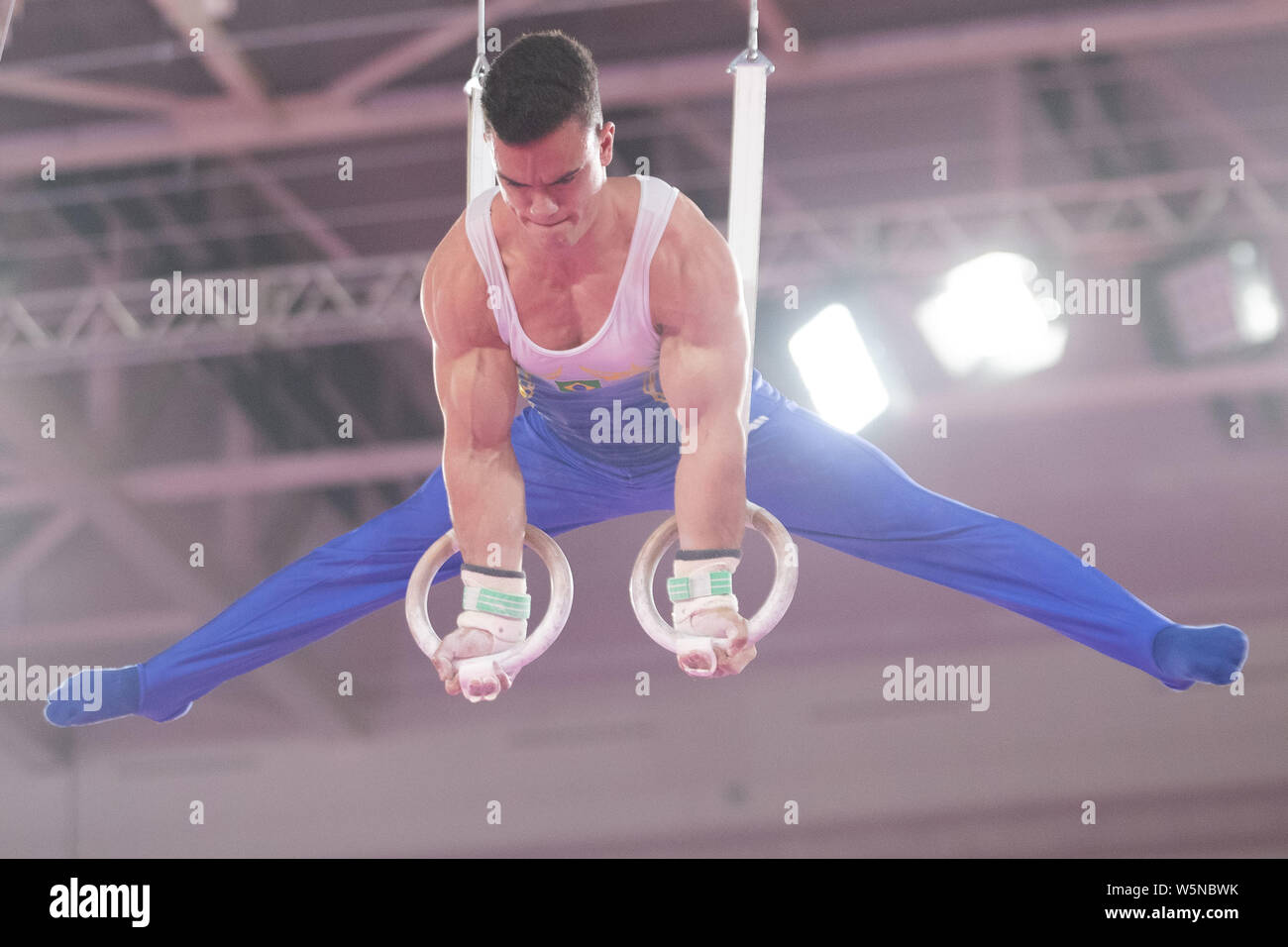 Lima, Peru. 28th July, 2019. Caio Souza (#80) of Brazil performs on the still rings during the Pan American Games Artistic Gymnastics, Men's Team Qualification and Final at Polideportivo Villa el Salvador in Lima, Peru. Daniel Lea/CSM/Alamy Live News Stock Photo