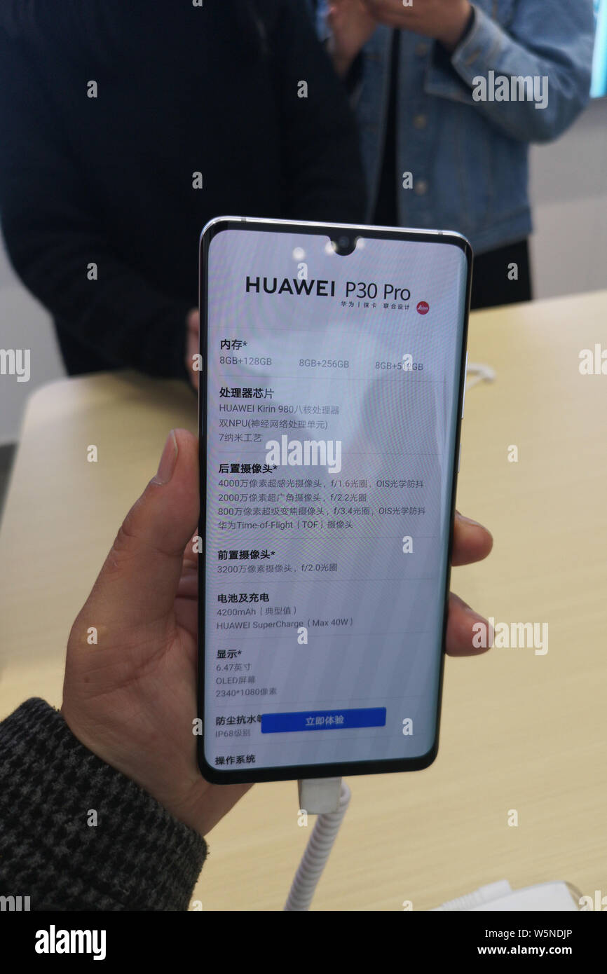 A Customer Shows A Huawei P30 Pro Smartphone At A Huawei Store In Shanghai China 2 April 19 Huawei S Back With Another Porsche Design Model An Stock Photo Alamy