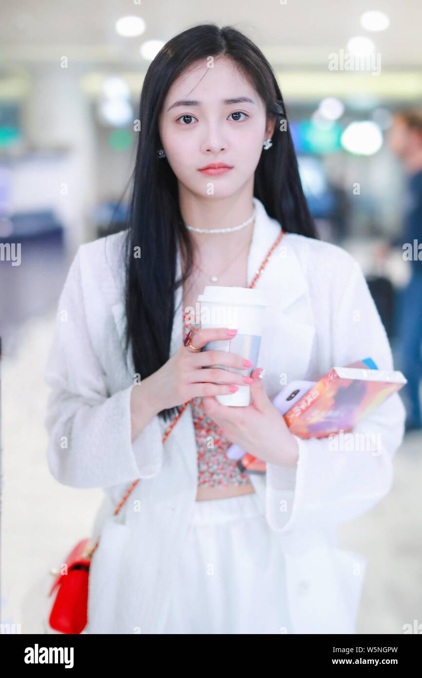 Chinese singer and dancer Pinky Zhou or Zhou Jieqiong arrives at the
