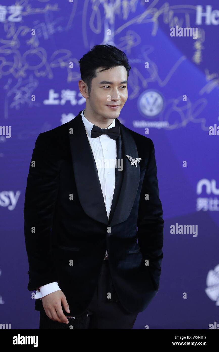Chinese actor Huang Xiaoming arrives on the red carpet for the closing ...