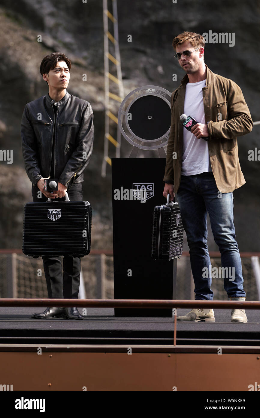 Australian actor Chris Hemsworth right and Chinese actor Li