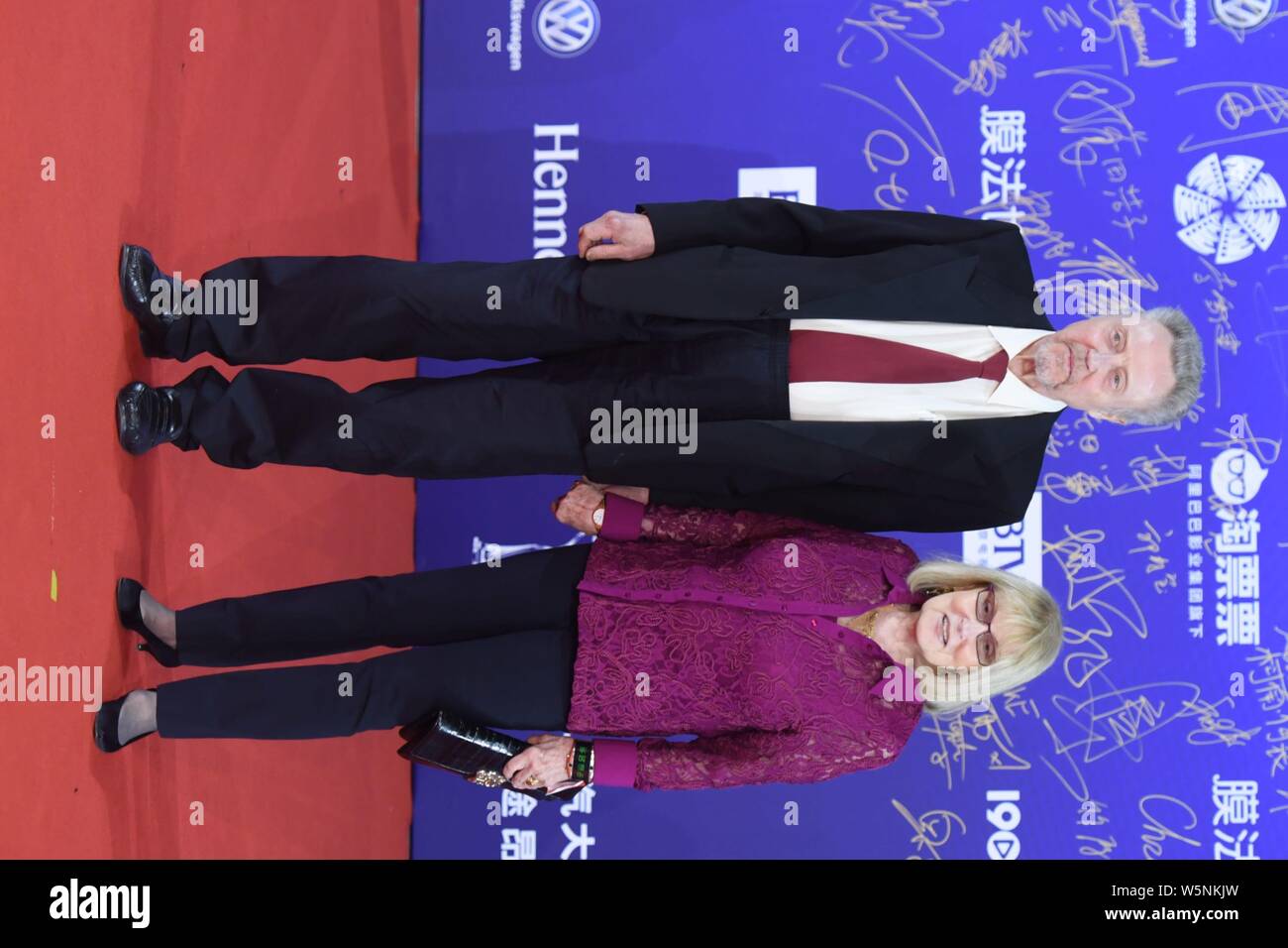 American actor Christopher Walken, left, and his wife Georgianne pose as they arrive on the red carpet for the opening ceremony of the 9th Beijing Int Stock Photo