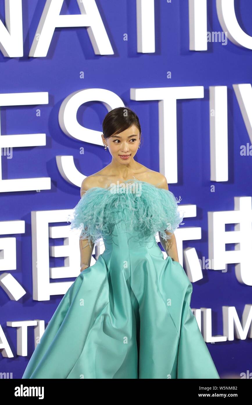 Chinese actress Wu Jinyan poses as she arrives on the red carpet for ...