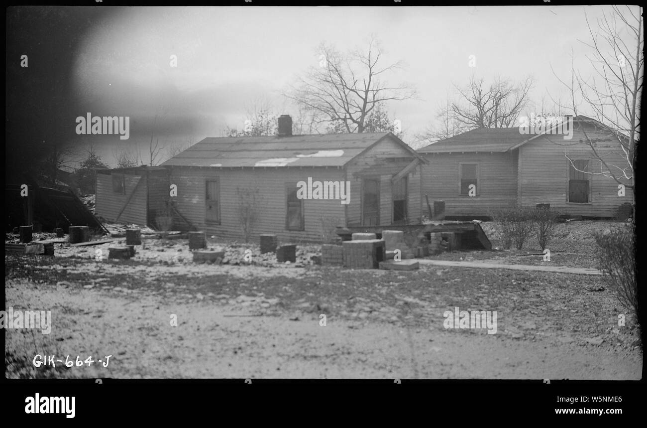 House moved off of foundation by flood Stock Photo