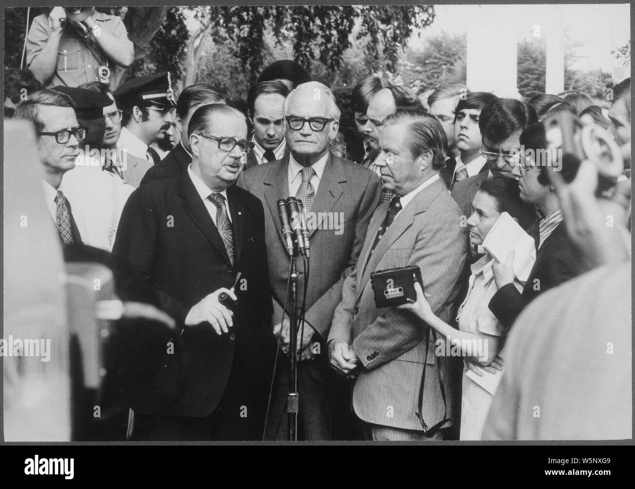 Infromal press conference following a meeting between Congressmen and the President to discuss Watergate matters.; Scope and content:  Pictured: Hugh Scott, Barry Goldwater, John J. Rhodes. Subject: Last Day. Stock Photo